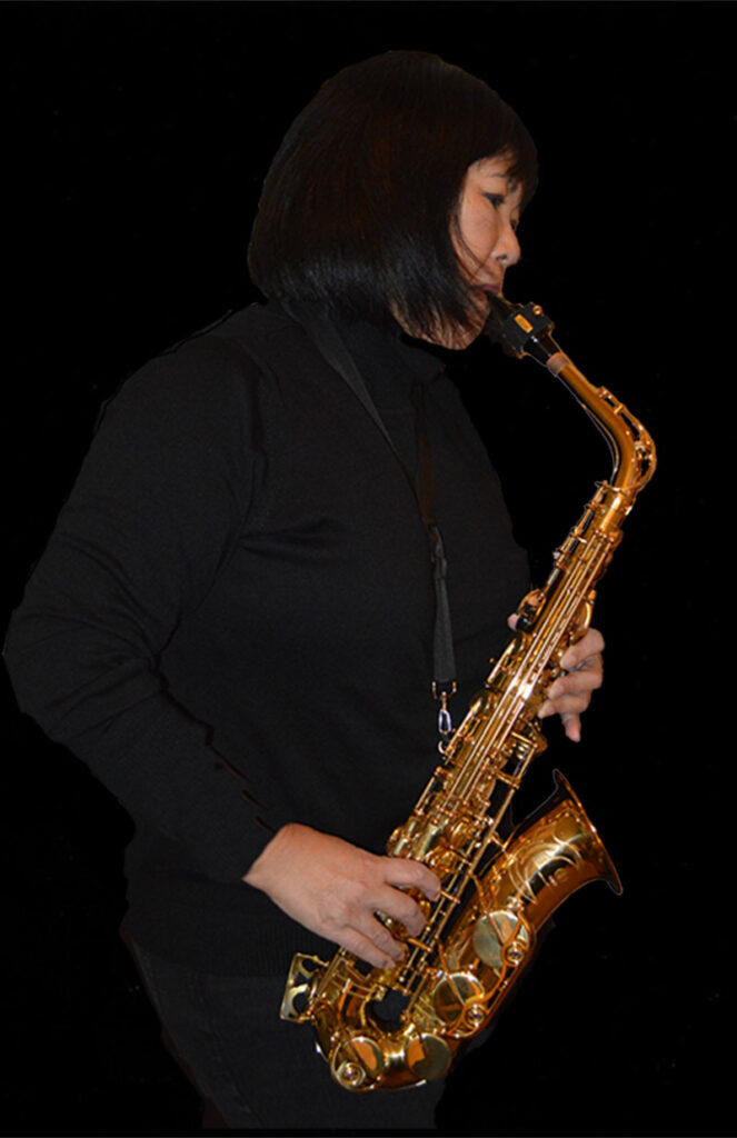 Sheila with alto saxophone